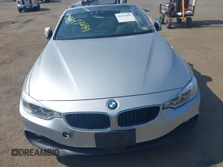 2014 BMW 4 Series 428i with VIN WBA3V7C55EJ873028, listed as a IAAI auction lot 42432699 with 24,063 mi miles and . Bid and sale history available at DreamBid. Image 13.