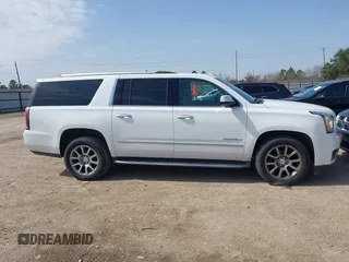 2019 GMC Yukon XL Denali with VIN 1GKS1HKJ8KR378385, listed as a IAAI auction lot 41580041 with 115,481 mi miles. Bid and sale history available at carsss.com. Image 13.