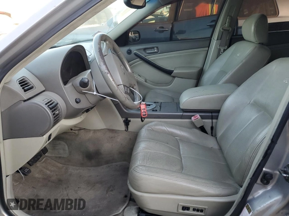 2004 Infiniti G35 w/Leather with VIN JNKCV51E24M611120, listed as a Copart auction lot 87978525 with 238,053 mi miles and Salvage Title. Bid and sale history available at DreamBid. Image 7.