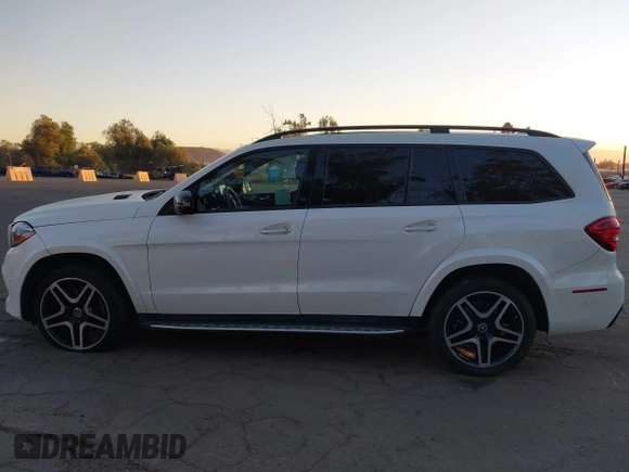2018 Mercedes-Benz GLS 550 z VIN 4JGDF7DE2JB097282, wystawiony jako IAAI lot #41060046 z przebiegiem 71 317 mil mil oraz . Historia ofert i sprzedaży dostępna na DreamBid. Obrazek 14.