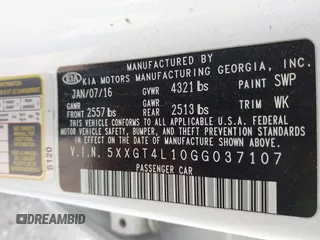 2016 Kia Optima LX Turbo with VIN 5XXGT4L10GG037107, listed as a IAAI auction lot 42071593 with 152,919 mi miles. Bid and sale history available at carsss.com. Image 9.