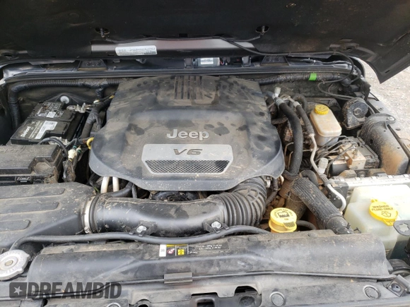 2018 Jeep Wrangler JK Unlimited Sahara with VIN 1C4HJWEG7JL909023, listed as a Copart auction lot 72774404 with 106,801 mi miles and Salvage Title. Bid and sale history available at carsss.com. Image 12.