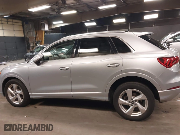 2021 Audi Q3 Premium with VIN WA1AUCF34M1078805, listed as a IAAI auction lot 42026360 with 38,473 mi miles and . Bid and sale history available at DreamBid. Image 14.