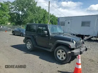 2012 Jeep Wrangler Sport with VIN 1C4AJWAG6CL256792, listed as a Copart auction lot 62634515 with 137,507 mi miles and Salvage title. Bid and sale history available at DreamBid. Image 14.