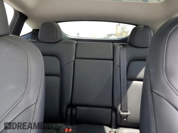2023 Tesla Model Y Long Range z VIN 7SAYGDEE8PA030286, wystawiony jako Copart lot #50945465 z przebiegiem 43 676 mil mil oraz Szkoda całkowita • Salvage title. Historia ofert i sprzedaży dostępna na DreamBid. Obrazek 10.