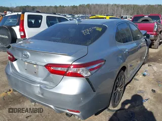 2020 Toyota Camry SE with VIN 4T1M11AK8LU923212, listed as a IAAI auction lot 41257204 with 66,289 mi miles. Bid and sale history available at carsss.com. Image 4.