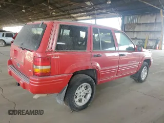 1998 Jeep Grand Cherokee Limited with VIN 1J4GZ78Y0WC294461, listed as a Copart auction lot 69477664 with 209,295 mi miles and Clean Title. Bid and sale history available at carsss.com. Image 3.