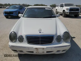 2000 Mercedes-Benz E-Class with VIN WDBJF65J5YB054237, listed as a Copart auction lot 76315974 with 95,092 mi miles and Salvage Title. Bid and sale history available at carsss.com. Image 5.