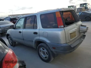 1999 Honda CR-V LX with VIN JHLRD2848XC011581, listed as a Copart auction lot 77183294 with 218,474 mi miles and Salvage Title. Bid and sale history available at carsss.com. Image 2.