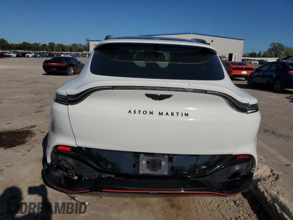 2021 Aston Martin DBX z VIN SCFVUJAW8MTV02134, wystawiony jako Copart lot #72456004 z przebiegiem Nie podano mil oraz Szkoda całkowita • Salvage title. Historia ofert i sprzedaży dostępna na DreamBid. Obrazek 6.