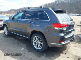 2014 Jeep Grand Cherokee Summit with VIN 1C4RJFJM5EC377129, listed as a IAAI auction lot 41763932 with 187,561 mi miles and . Bid and sale history available at DreamBid. Image 3.