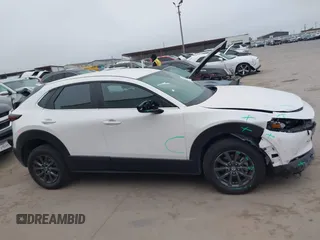 2022 Mazda CX-30 S with VIN 3MVDMBALXNM422418, listed as a IAAI auction lot 41531552 with 21,909 mi miles and . Bid and sale history available at carsss.com. Image 13.