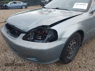 2000 Honda Civic EX z VIN 1HGEJ8644YL006150, wystawiony jako IAAI lot #42149964 z przebiegiem 195 489 mil mil oraz . Historia ofert i sprzedaży dostępna na DreamBid. Obrazek 6.