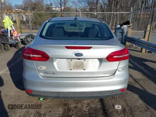 2018 Ford Focus SE with VIN 1FADP3F28JL239860, listed as a IAAI auction lot 41497350 with 84,666 mi miles. Bid and sale history available at carsss.com. Image 16.