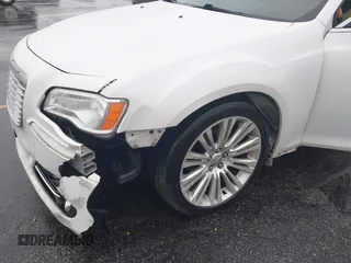 2014 Chrysler 300 with VIN 2C3CCAEG1EH380389, listed as a IAAI auction lot 41544101 with 186,314 mi miles. Bid and sale history available at carsss.com. Image 6.