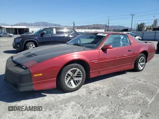 1990 Pontiac Firebird z VIN 1G2FS23T2LL206191, wystawiony jako Copart lot #76175064 z przebiegiem 103 903 mil mil oraz Szkoda całkowita • Salvage title. Historia ofert i sprzedaży dostępna na DreamBid. Obrazek 1.