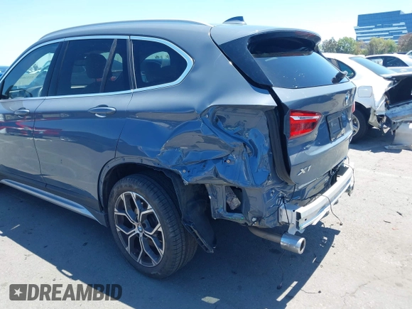 2021 BMW X1 sDrive28i z VIN WBXJG7C02M5T37169, wystawiony jako IAAI lot #42226396 z przebiegiem 48 603 mil mil oraz . Historia ofert i sprzedaży dostępna na DreamBid. Obrazek 6.