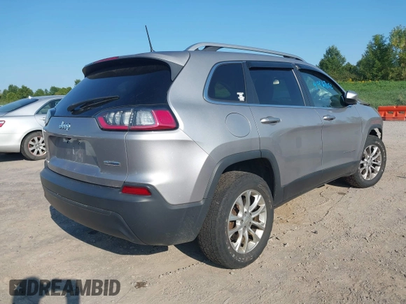 2019 Jeep Cherokee Latitude with VIN 1C4PJMCB5KD107122, listed as a IAAI auction lot 40267152 with 113,822 mi miles. Bid and sale history available at carsss.com. Image 4.