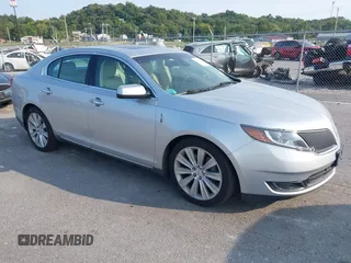 2013 Lincoln MKS EcoBoost with VIN 1LNHL9FT7DG615377, listed as a IAAI auction lot 40316908 with 22,096 mi miles and . Bid and sale history available at DreamBid. Image 1.