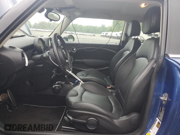 2013 MINI Hardtop S with VIN WMWSV3C55DT387777, listed as a Copart auction lot 56495215 with 53,033 mi miles and Salvage title. Bid and sale history available at DreamBid. Image 7.