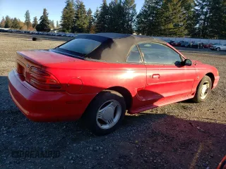 1995 Ford Mustang with VIN 1FALP4449SF205979, listed as a Copart auction lot 79690704 with 100,257 mi miles and Clean title. Bid and sale history available at DreamBid. Image 3.