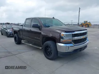 2016 Chevrolet Silverado 1500 LT with VIN 1GCRCREC8GZ180162, listed as a IAAI auction lot 41946432 with 162,090 mi miles and . Bid and sale history available at DreamBid. Image 1.