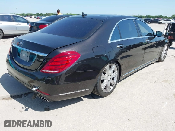 2014 Mercedes-Benz S-Class S 550 with VIN WDDUG8CB9EA009280, listed as a IAAI auction lot 42001730 with 217,213 mi miles. Bid and sale history available at carsss.com. Image 4.