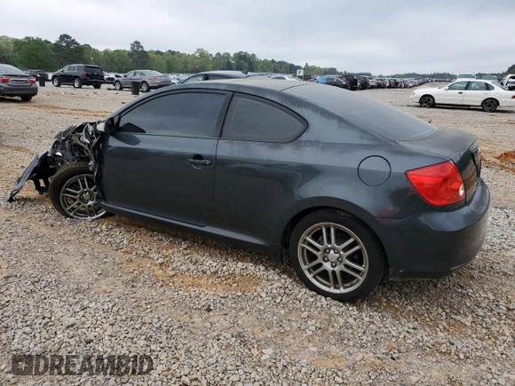2007 Scion tC Spec z VIN JTKDE167570179636, wystawiony jako Copart lot #51235535 z przebiegiem 184 645 mil mil oraz Szkoda całkowita • Salvage title. Historia ofert i sprzedaży dostępna na DreamBid. Obrazek 2.