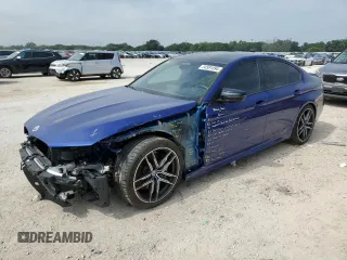 2023 BMW M5 with VIN WBS83CH06PCM62287, listed as a Copart auction lot 54581894 with 0 mi miles and Salvage Title. Bid and sale history available at carsss.com. Image 1.
