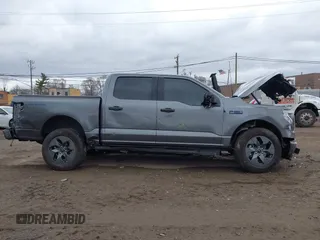 2024 Ford F-150 Lightning XLT z VIN 1FTVW3LK0RWG14334, wystawiony jako IAAI lot #41856218 z przebiegiem 2 037 mil mil oraz . Historia ofert i sprzedaży dostępna na DreamBid. Obrazek 13.