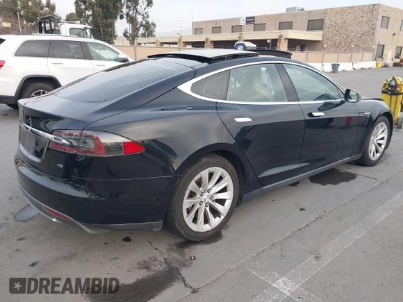 2016 Tesla Model S 70 with VIN 5YJSA1E11GF132015, listed as a IAAI auction lot 41408676 with 137,271 mi miles and . Bid and sale history available at DreamBid. Image 4.