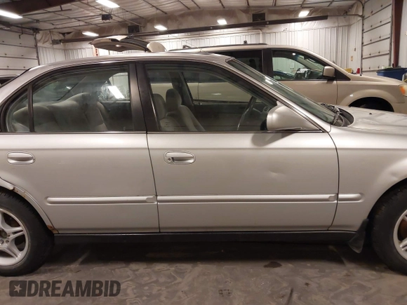 1996 Honda Civic EX with VIN 1HGEJ864XTL053613, listed as a IAAI auction lot 41717526 with 247,022 mi miles. Bid and sale history available at carsss.com. Image 14.