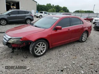 2012 Ford Fusion SEL z VIN 3FAHP0JG2CR309554, wystawiony jako Copart lot #60869895 z przebiegiem 199 134 mil mil oraz Szkoda całkowita • Salvage title. Historia ofert i sprzedaży dostępna na DreamBid. Obrazek 1.