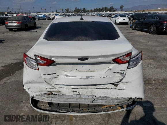 2016 Ford Fusion SE Hybrid с VIN 3FA6P0LU2GR360066, выставлен на аукционе Copart как лот 84767824 с пробегом 153 044 миль миль и Списание • Salvage title. История ставок и продаж доступна на DreamBid. Изображение 6.