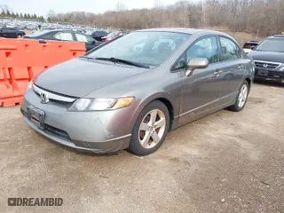 2008 Honda Civic Sdn EX with VIN 1HGFA15868L024617, listed as a IAAI auction lot 41831376 with 130,279 mi miles. Bid and sale history available at carsss.com. Image 2.