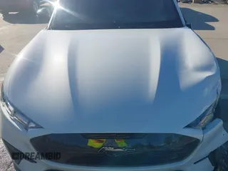 2023 Ford Mustang Mach-E GT z VIN 3FMTK4SE4PMA54704, wystawiony jako IAAI lot #42163871 z przebiegiem 67 987 mil mil oraz . Historia ofert i sprzedaży dostępna na DreamBid. Obrazek 10.