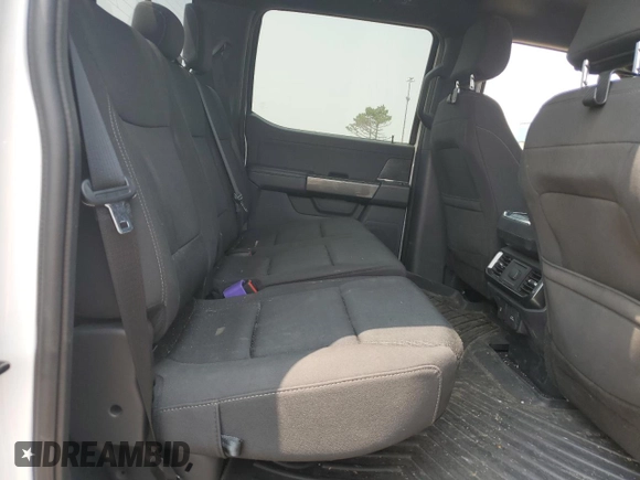 2023 Ford F-150 XL with VIN 1FTEW1EP7PFB66555, listed as a Copart auction lot 59384665 with 28,495 mi miles and Salvage title. Bid and sale history available at DreamBid. Image 10.