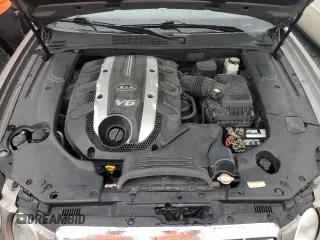 2007 Kia Amanti z VIN KNALD125075127213, wystawiony jako Copart lot #74394214 z przebiegiem Nie podano mil oraz Szkody całkowita. Historia ofert i sprzedaży dostępna na DreamBid. Obrazek 11.