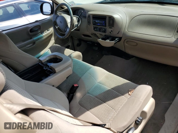2002 Ford F-150 XL z VIN 1FTRX17W52NB81525, wystawiony jako Copart lot #57981075 z przebiegiem 236 673 mil mil oraz Szkoda całkowita • Salvage title. Historia ofert i sprzedaży dostępna na DreamBid. Obrazek 8.