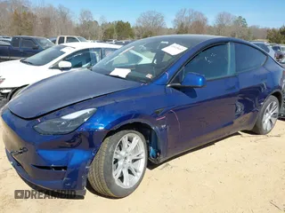 2023 Tesla Model Y Long Range with VIN 7SAYGDEE6PF847890, listed as a IAAI auction lot 41635687 with 32,846 mi miles and . Bid and sale history available at DreamBid. Image 2.
