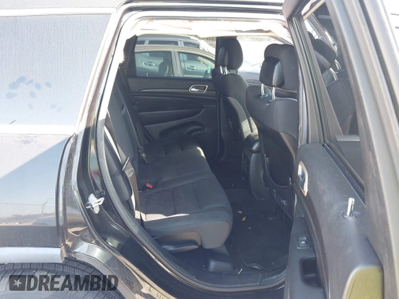 2014 Jeep Grand Cherokee Laredo with VIN 1C4RJEAG7EC263590, listed as a IAAI auction lot 41699106 with 136,581 mi miles and . Bid and sale history available at DreamBid. Image 8.