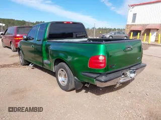 2001 Ford F-150 XL with VIN 2FTRX07WX1CA79197, listed as a IAAI auction lot 41655618 with 267,846 mi miles. Bid and sale history available at carsss.com. Image 3.