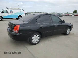 2004 Hyundai Elantra GLS z VIN KMHDN46D14U812275, wystawiony jako Copart lot #54163945 z przebiegiem 209 400 mil mil oraz Szkoda całkowita • Salvage title. Historia ofert i sprzedaży dostępna na DreamBid. Obrazek 3.