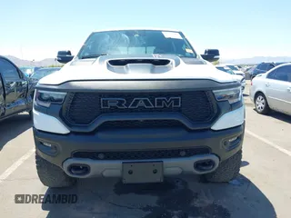 2022 Ram 1500 TRX with VIN 1C6SRFU95NN245954, listed as a IAAI auction lot 42032210 with 30,870 mi miles and . Bid and sale history available at DreamBid. Image 12.