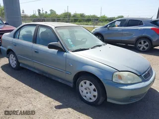 2000 Honda Civic VP with VIN 2HGEJ6616YH553654, listed as a IAAI auction lot 41551656 with 210,433 mi miles. Bid and sale history available at carsss.com. Image 1.