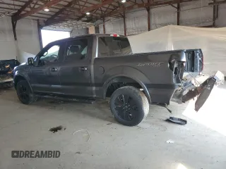 2020 Ford F-150 XL with VIN 1FTEW1E44LFC02735, listed as a Copart auction lot 62062125 with 111,471 mi miles and Salvage title. Bid and sale history available at DreamBid. Image 2.