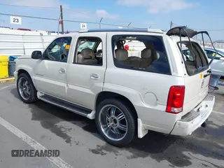 2003 Cadillac Escalade z VIN 1GYEK63N93R319255, wystawiony jako IAAI lot #42371706 z przebiegiem 171 656 mil mil oraz . Historia ofert i sprzedaży dostępna na DreamBid. Obrazek 3.