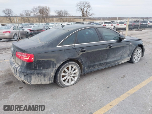 2013 Audi A6 3.0T Prestige with VIN WAUHGAFC3DN061788, listed as a IAAI auction lot 41129245 with 137,575 mi miles. Bid and sale history available at carsss.com. Image 4.