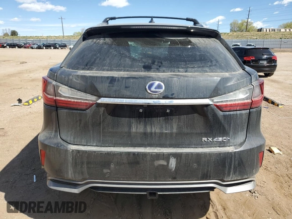 2016 Lexus RX 450h with VIN 2T2BGMCA9GC004141, listed as a Copart auction lot 52637505 with 143,292 mi miles and Salvage Title. Bid and sale history available at DreamBid. Image 6.