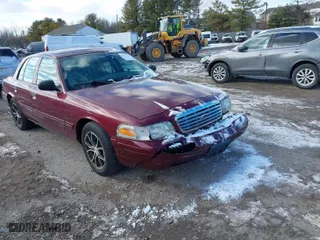 2004 Ford Crown Victoria Standard with VIN 2FAFP73W74X150232, listed as a IAAI auction lot 41277271 with 146,518 mi miles. Bid and sale history available at carsss.com. Image 1.